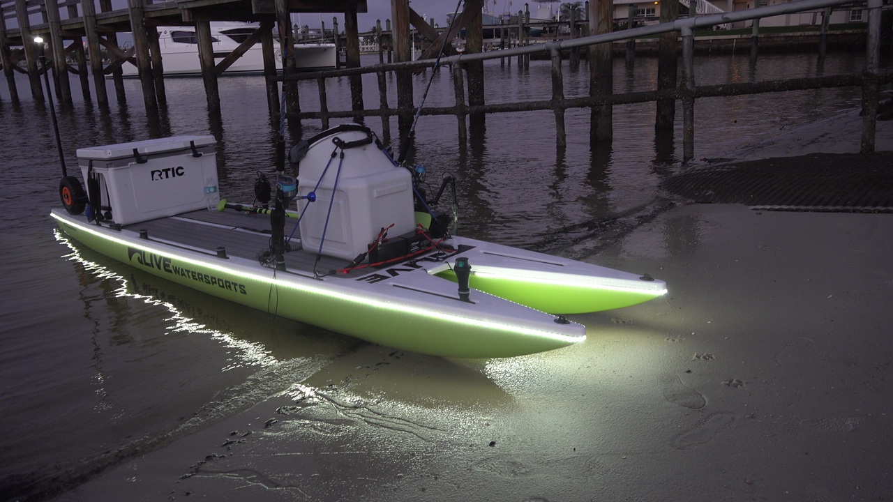 Lit up Catamaran Paddle Board Fishing on L4Expedition by Live Watersports